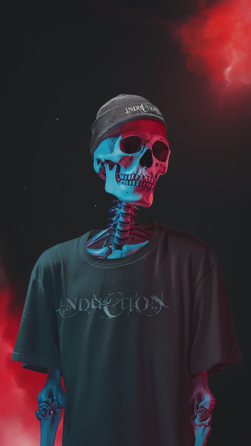 Skeleton wearing Induction T-shirt and cap, set against a dark and red cosmic background, optimized for mobile view.